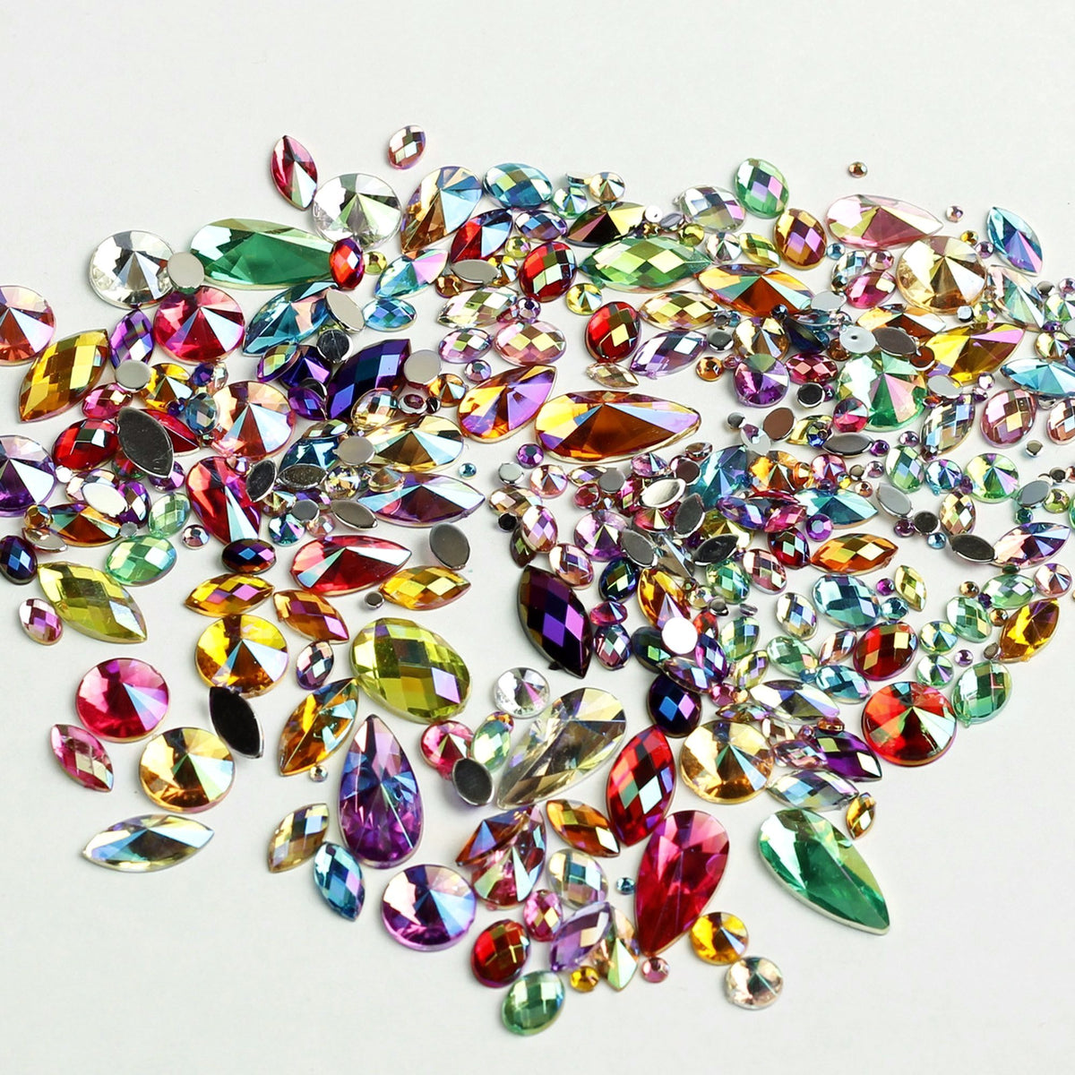 Sparkling iridescent gems in  rainbow mix of colours. Ideal for Glamoween sugar skull creations.