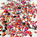 "Ruby" 15g Bag of Flat Back Face Gems in a Variety of Shapes and Sizes