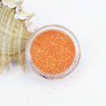 evol translucent iridescent orange dust face glitter