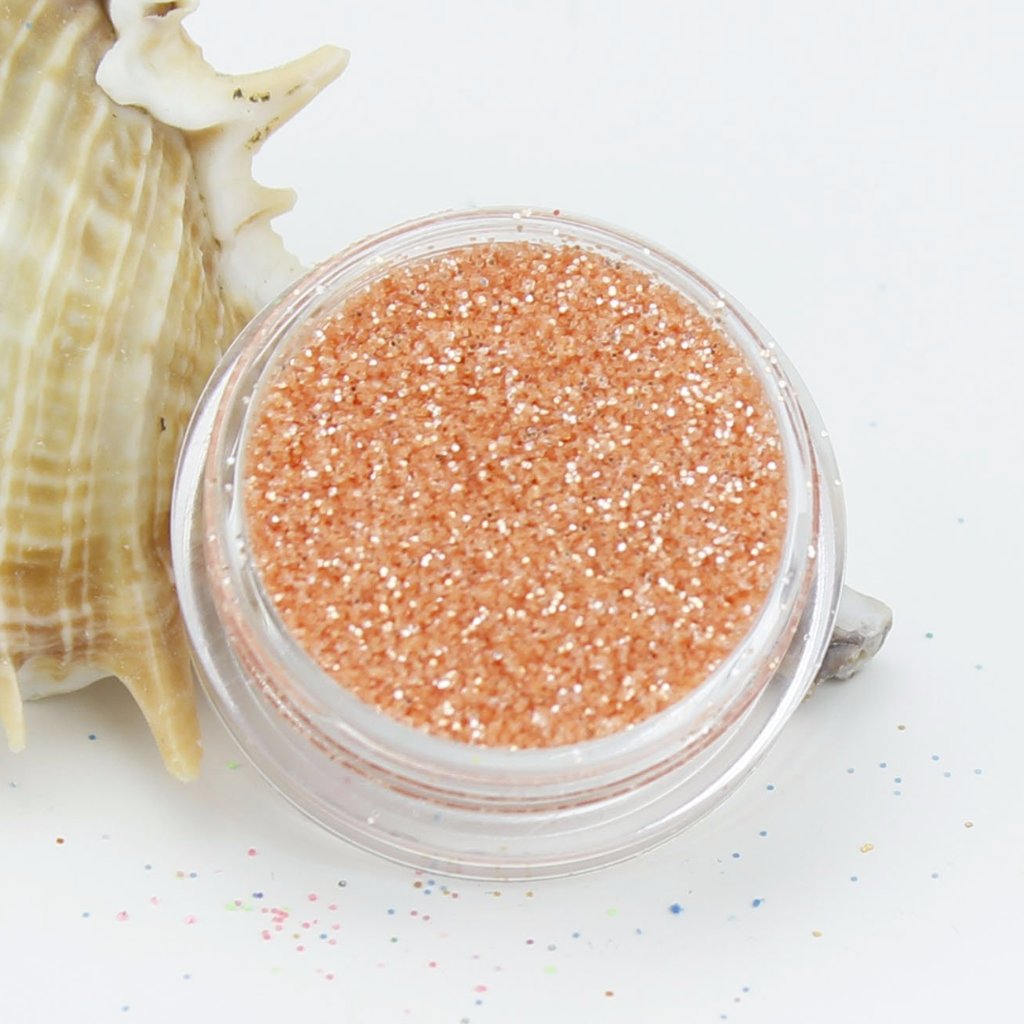evol crushed ice orange dust face glitter